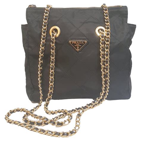 prada black bag gold chain